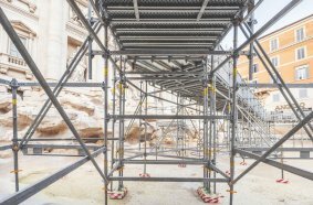 The scaffolding supports were placed on rubber pads and wooden boards to protect the vulnerable surface of the Trevi Fountain.