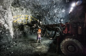 Mining machinery at work in a confined underground