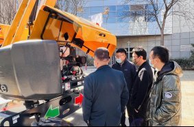 Visitors getting hands on experience and technical explanations with Haulotte lifting equipment