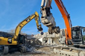Hydraulic excavators and KEMROC milling attachments were used by HR Abbruch in Koblenz where a former high-rise bunker is being transformed into a residential complex. 