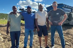 A satisfied team in Tanzania during the machine handover