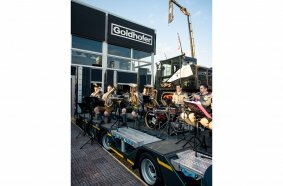 Bavarian stand party at Goldhofer - with live brass music on the exhibition vehicles