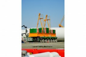 Additional Ballast is being carried with an SMTP transporter to speed rigging the crane for heavy lifts.
