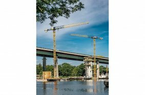 The replacement structure for the eastern half of the bridge is being built next to the existing bridge and is scheduled for completion in 2026.