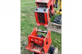 Powertilt Rototilt swivel motor with HS03V and view of the short-stroke valves: Lehnhoff has protected the hydraulic hoses and connections.