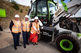 Shadow Chancellor Rachel Reeves MP tries her hand at the quick and simple task of refuelling a JCB backhoe loader with hydrogen, watched by JCB Chief Innovation and Growth Director Tim Burnhope (left) and Gary Smith, the General Secretary of the GMB Union. 