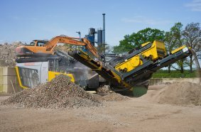 The R3 impact crusher being fed and controlled by the excavator operator via remote control.