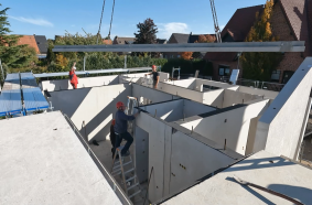 The wall panels and concrete elements used to build the complete “recycled” 3-family house in just 4 months.