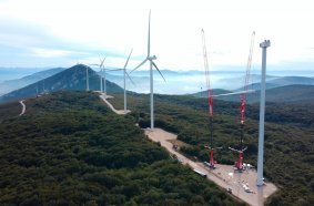 Two Liebherr mobile cranes, an LTM 1750-9.1 and an LTM 1650.8.1 from Grúas Ibarrondo replacing three rotor blades on a wind turbine at the Cener-Alaiz experimental offshore wind farm.