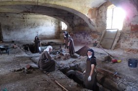 Nuns restoring the gallery system in the granary <br> Image source: DOOSAN BOBCAT EMEA