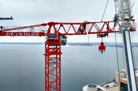 Potain tower cranes help transform Madison’s downtown skyline under an airport flight path