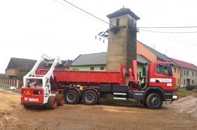 Tornadoes or Flash Floods - Bobcat Loaders Aid Firefighters