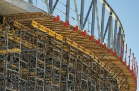 Shoring construction consisting of ST 100 Stacking Towers for load transfer of the cantilevered platform at the top