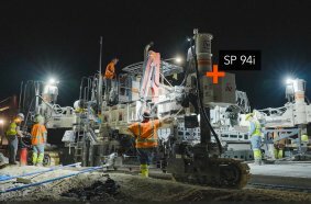 The Wirtgen SP 94i can be equipped with a machine-integrated dowel bar inserter.