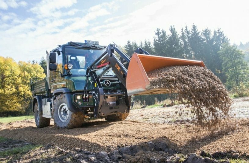 Unimog implement carrier with front loader<br>IMAGE SOURCE: Daimler Truck AG