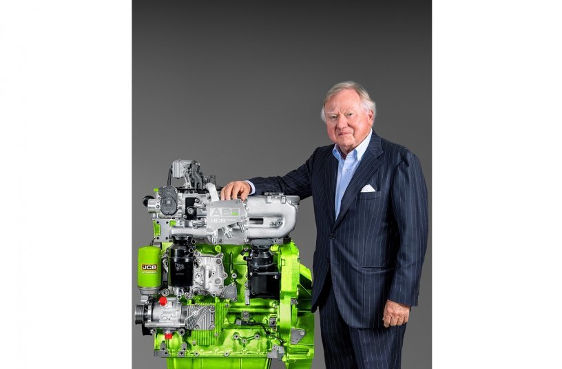 Lord Bamford and the JCB hydrogen engine.<br>IMAGE SOURCE: JCB