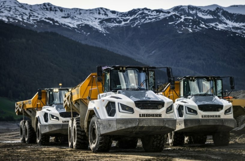 Ten Liebherr TA 230 Litronic dump trucks are involved in a major project at Lake Reschen in the municipality of Graun in Vinschgau (Italy).<br>IMAGE SOURCE: Liebherr-Hydraulikbagger GmbH