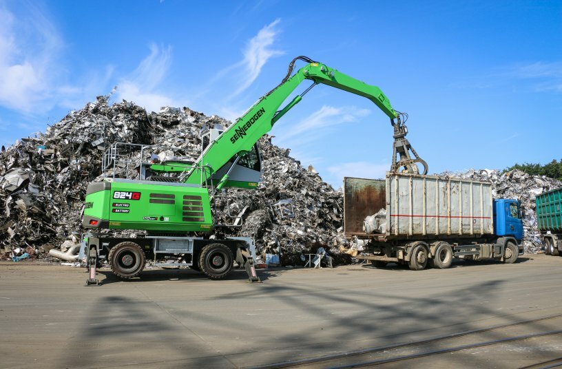 The 824 G Electro Battery loads material onto trucks with noticeable power. <br>IMAGE SOURCE: SENNEBOGEN