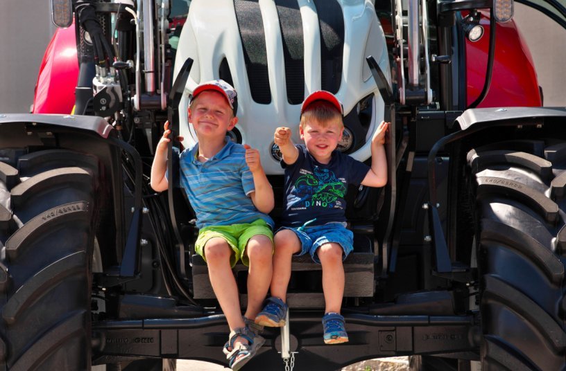 STEYR Open Days Young Visitors on Tractor<br>IMAGE SOURCE: Steyr; CNH Industrial 