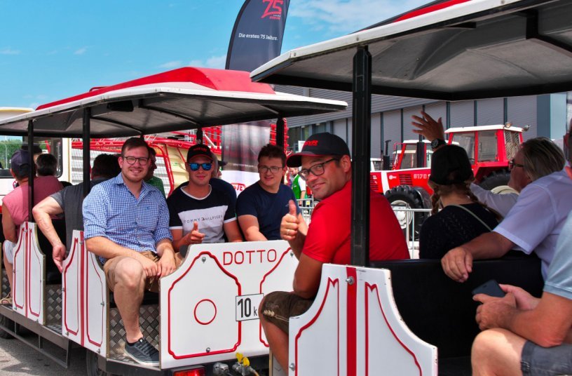 STEYR Open Days Visitors on Factory Tour in small trains<br>IMAGE SOURCE: Steyr; CNH Industrial 