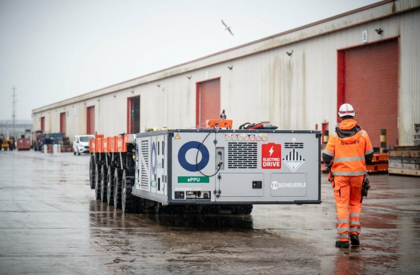 For the operation, Osprey deployed the electric PowerPack Unit in a complex port environment, transporting a critical component entirely under electric power.<br>IMAGE SOURCE: TII Group