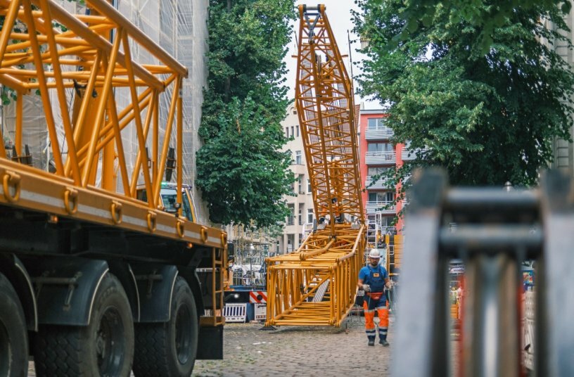 Preparing to lift: the Grove GMK6450-1 was rigged with a 73 m luffing jib and 115 t of counterweight inside an extremely tight urban site.<br>IMAGE SOURCE: Manitowoc