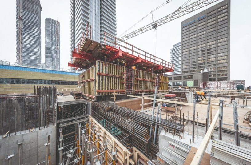 The ACS Core 400 system was chosen for its ability to lift the formwork and working platforms of the elevator and stair core between floors without requiring the tower crane and with minimal labour.<br>IMAGE SOURCE: PERI SE