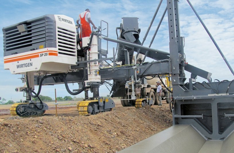 The spectrum of applications ranges from the paving of smaller gutters to large channel profiles, which can be paved either without a stringline with the AutoPilot system or with a conventional, physical stringline.<br>IMAGE SOURCE: WIRTGEN GROUP
