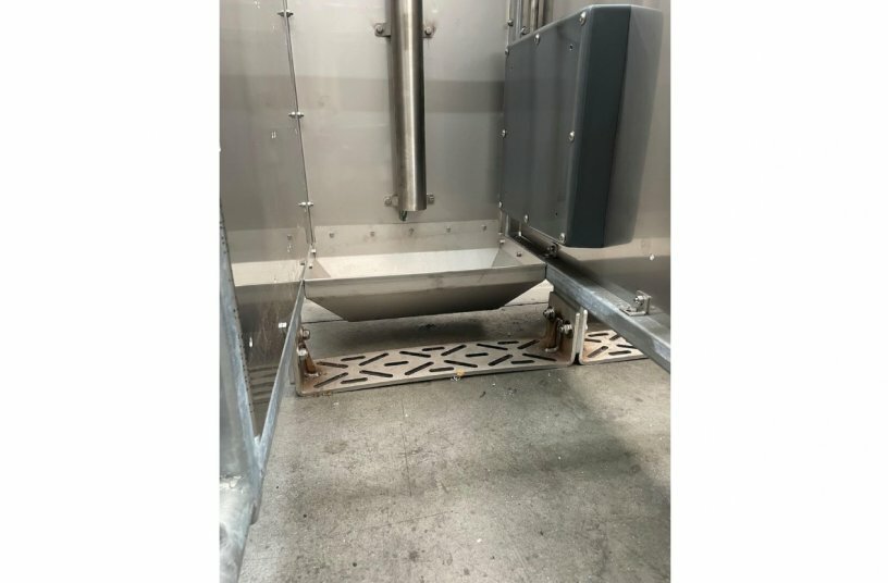 A motion sensor integrated into the trough’s outlet pipe physically detects when a sow approaches the trough to feed. At the same time, the station’s RFID antenna attempts to read the animal’s ear tag.<br>IMAGE SOURCE: WEDA