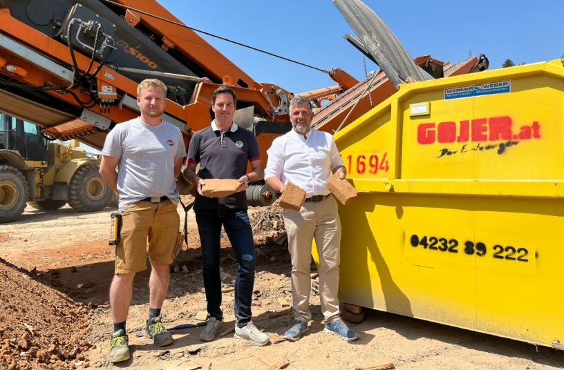 From left to right, Markus Silly (Machine Operator), Oskar Preinig (CEO) and Wolfgang Tischler (Customer Relations) in front of their new R1000S impact crusher<br>IMAGE SOURCE: Rockster Austria International GmbH