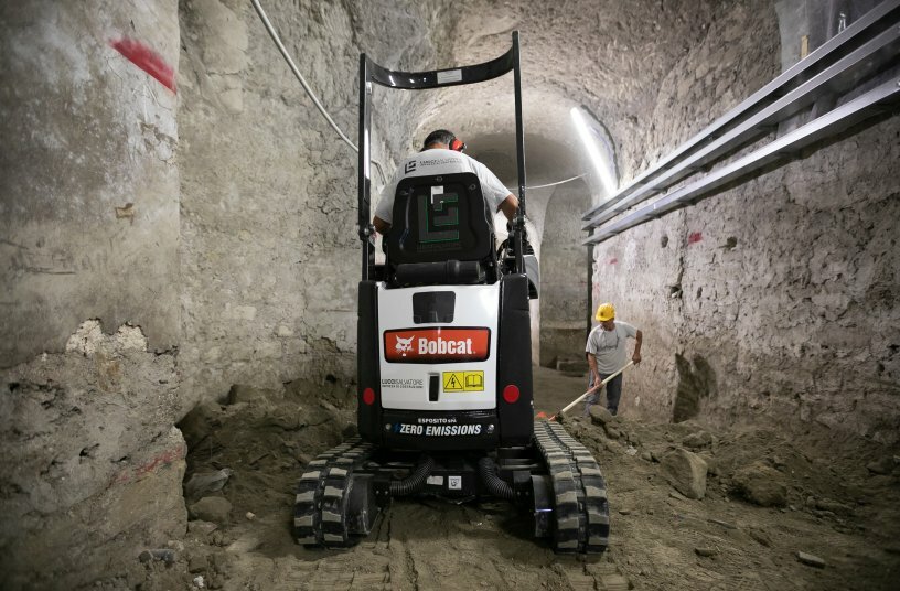 Bobcat E10e Electric Mini-Excavator Explores   Underground at Naples Landmark<br>IMAGE SOURCE: Doosan Bobcat EMEA