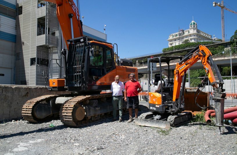 from left, Fabio Rampini, Picotto area manager for Liguria, Asti and Alessandria; Luigi Bonomelli, site manager for E.S.O. Strade.<br>IMAGE SOURCE: DEVELON