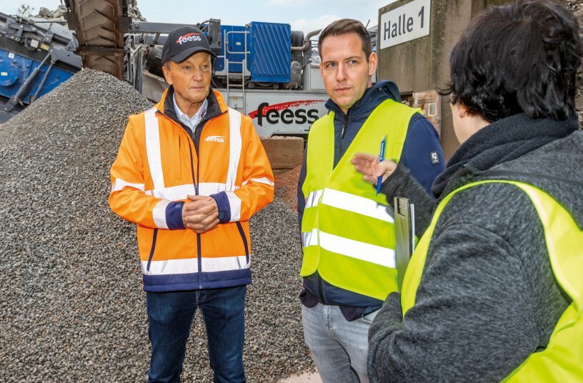 In conversation: Walter Feess, Michell Blasczyk (Wirtgen Germany), Claudia Hizman (Kleemann). <br>IMAGE SOURCE: WIRTGEN GROUP
