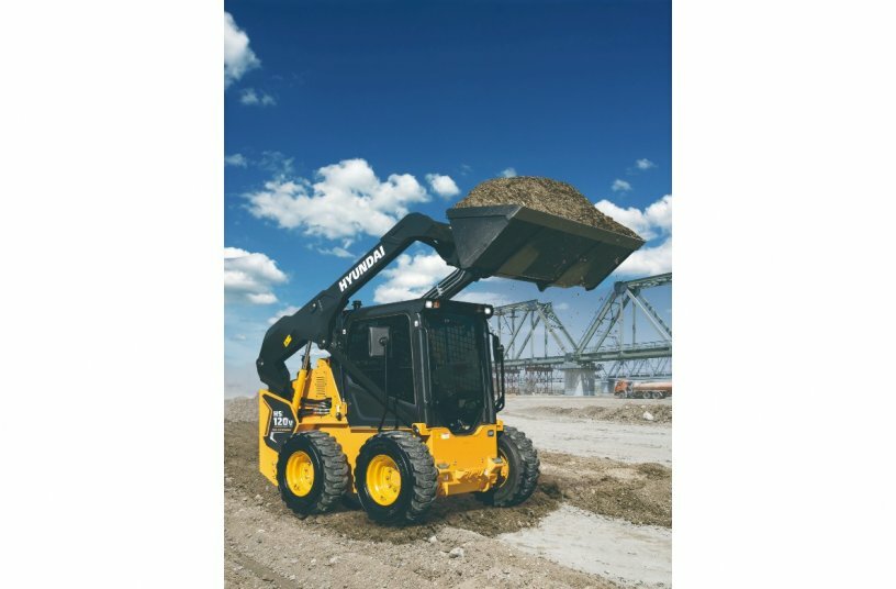 The Hyundai HS120V skid steer loader has a rated operating capacity of 2,690 pounds (1,220 kg), and its heaped bucket capacity is 0.58 yd3 (0.44 m3). <br>IMAGE SOURCE: Cooper Hong Inc.; Hyundai Construction Equipment Americas, Inc.