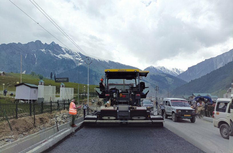 Precision paving in challenging terrain: Despite bends and uphill and downhill gradients, the Niveltronic Plus system for automated grade and slope control assured true to grade and slope paving results. <br>IMAGE SOURCE: WIRTGEN GROUP