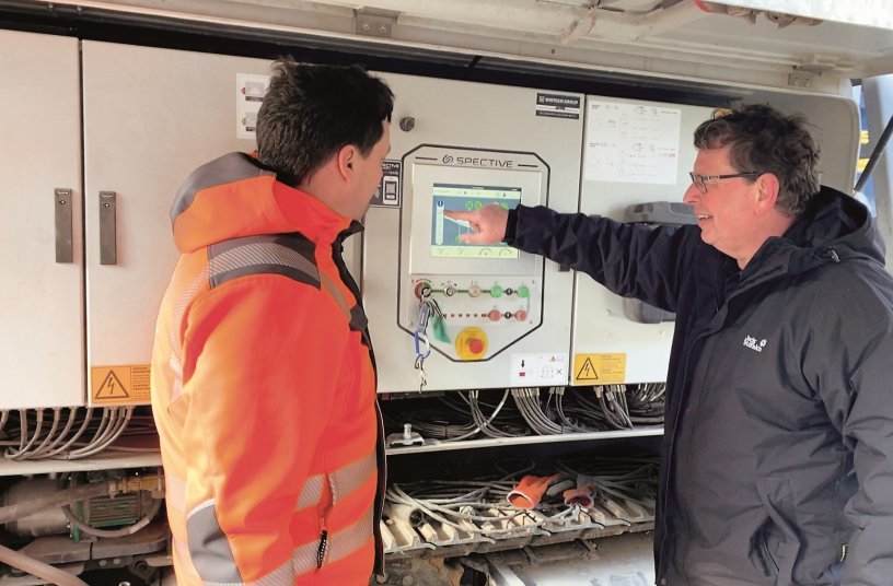 Erdtrans Managing Director Michael Schwarzer (left) and special consultant from Wirtgen Germany Peter Schabacker (right) viewing the new operating concept SPECTIVE. <br>IMAGE SOURCE: WIRTGEN GROUP