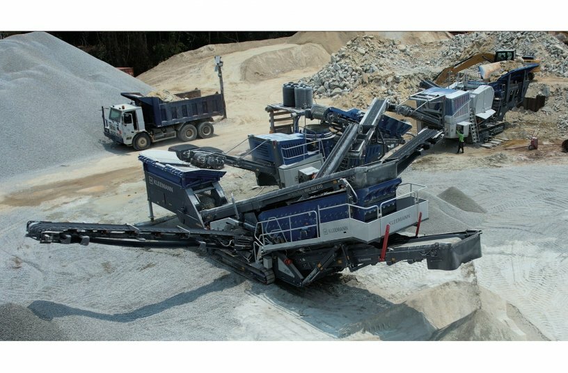 One of three plant trains, consisting of a jaw crusher, cone crusher and classifying screen from Kleemann, processing granite in the quarry.<br>IMAGE SOURCE: WIRTGEN GROUP
