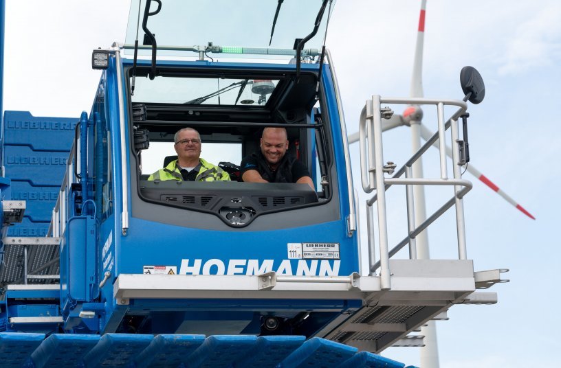 Good mood: Christian Bergmaier (left) and Stephan Dickel in the spacious cabin of their new Liebherr crawler crane. <br> Image source: Liebherr-Werk Ehingen GmbH