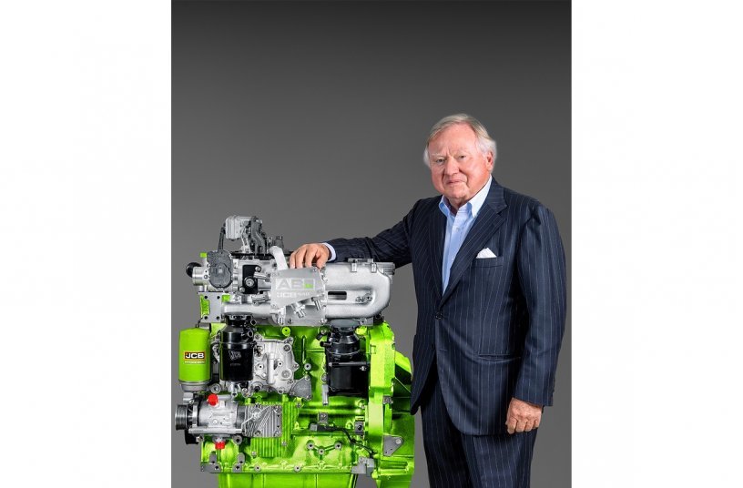 Lord Bamford and the JCB hydrogen engine.<br>IMAGE SOURCE: JCB