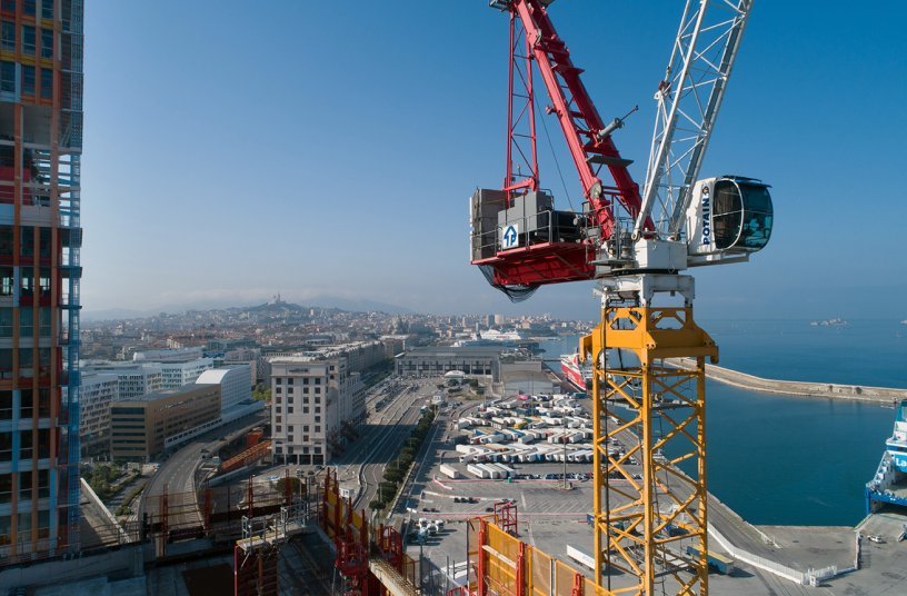 Potain MR 295 luffing jib cranes climb to new heights on high rise project in southern France<br>IMAGE SOURCE: THE MANITOWOC COMPANY, INC.
