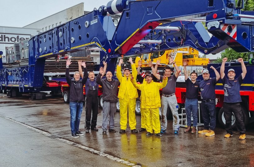 Proud faces: the combined Collett, Goldhofer and Greiner team during overload testing.<br>IMAGE SOURCE: Goldhofer