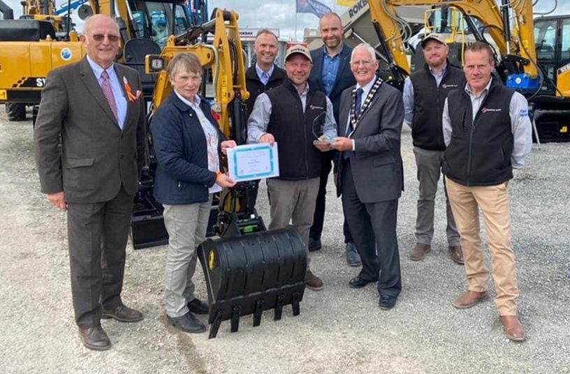 Sleator Plant staff celebrate their award for Best Trade Stand in the Other Equipment & Vehicles category at the 2021 Balmoral Show. <br> Image source: Rokbak