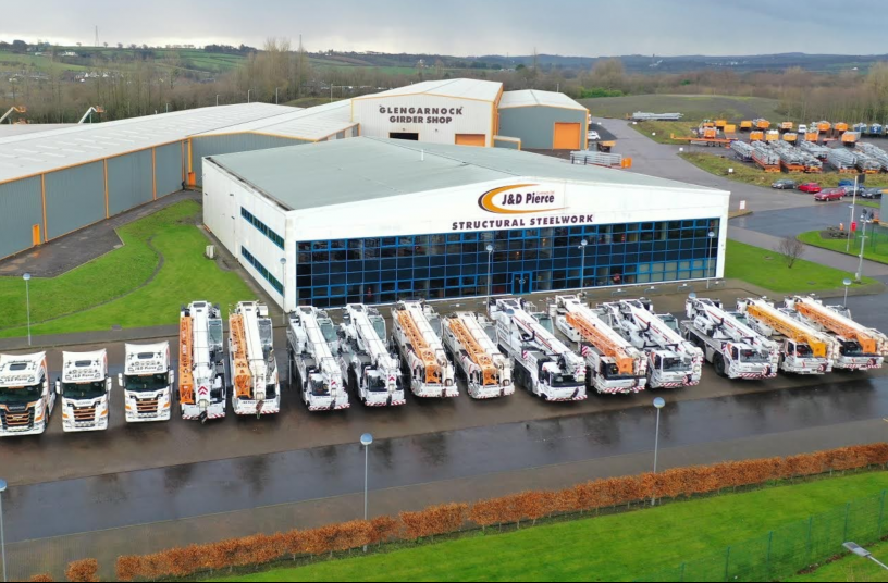The full J & D Pierce fleet of cranes, consisting entirely of Grove all-terrains, shown at the company’s headquarters in Glengarnock, UK. <br> Image source: MANITOWOC COMPANY, INC.