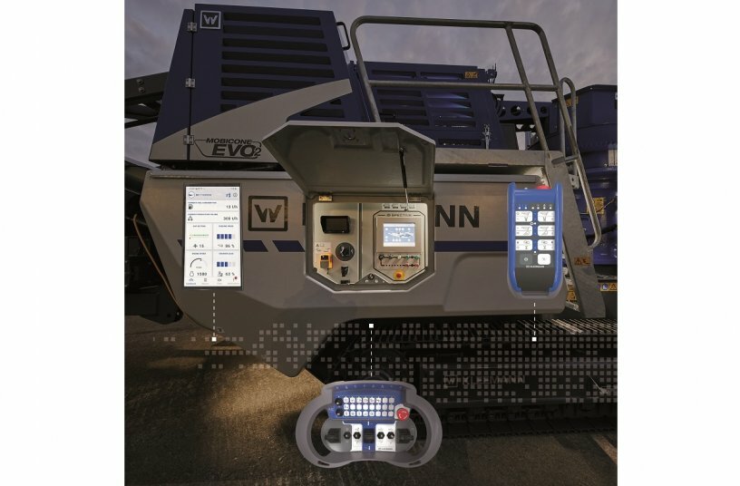 The SPECTIVE operating concept from Kleemann: touch panel on the plant, large radio remote control handset for setup and transport procedures, small radio remote control handset with all operating functions. SPECTIVE CONNECT – the new app with all relevant plant information and site reporting function.<br>IMAGE SOURCE: WIRTGEN GROUP