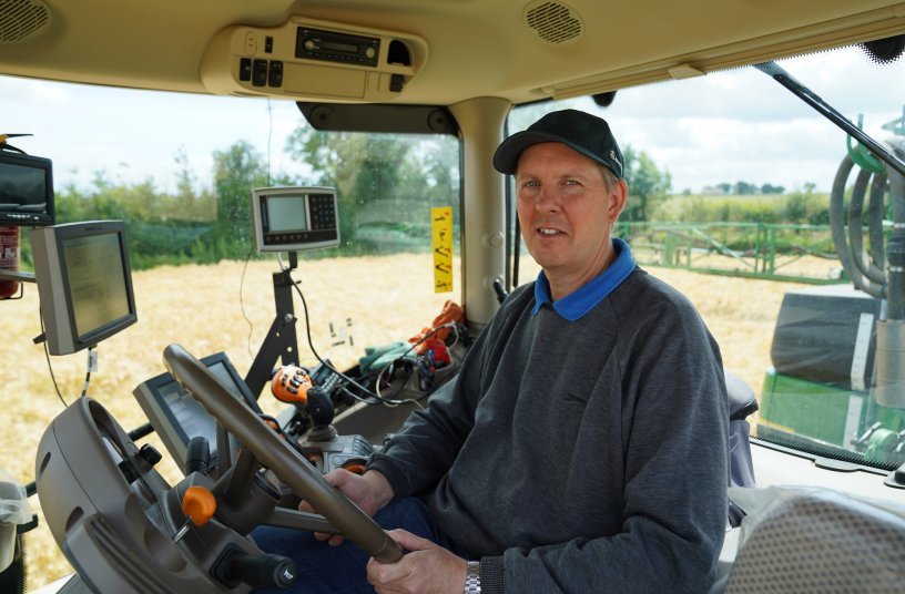 Steve May pulls the John Deere R962i with a 6215R AutoPowr<br>IMAGE SOURCE: John Deere