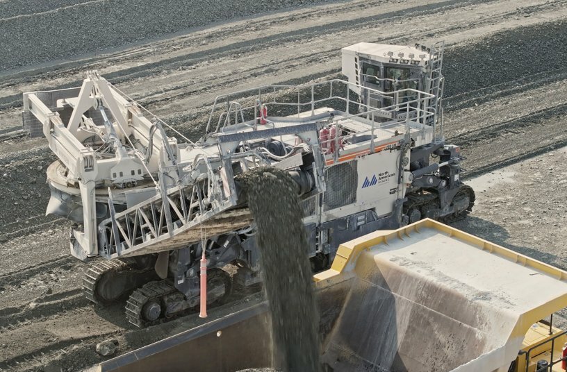 Continuous direct loading of 70-ton mining dump trucks is no problem at all for the Wirtgen Surface Miner.<br>IMAGE SOURCE: WIRTGEN GROUP