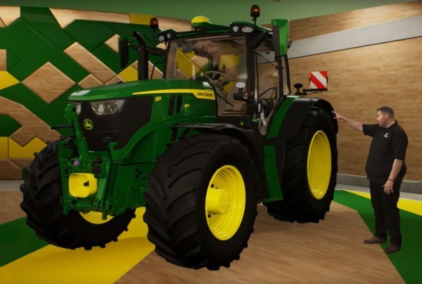 Gareth Gault, known as Donkey, from the Grassmen Instagram account, talks about the new John Deere 6R on the set of the Deere Studio.