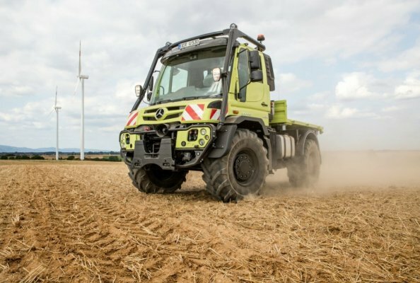Unimog U 530 implement carrier with agricultural equipment (front and rear PTO, front and rear power lift, agricultural tires, headland management)