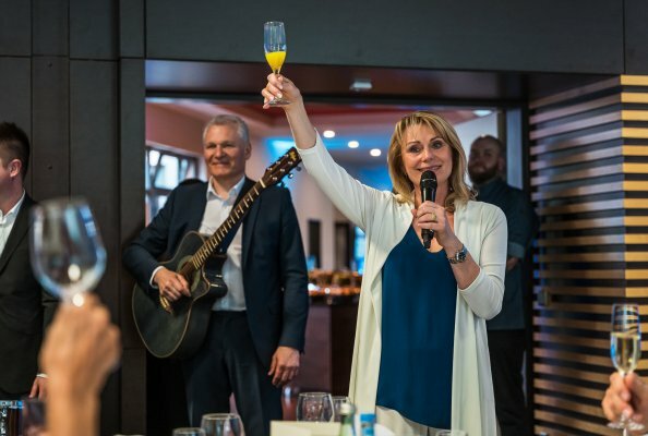 Iva Thiel, CEO, raised her glass to toast the anniversary of LECTURA