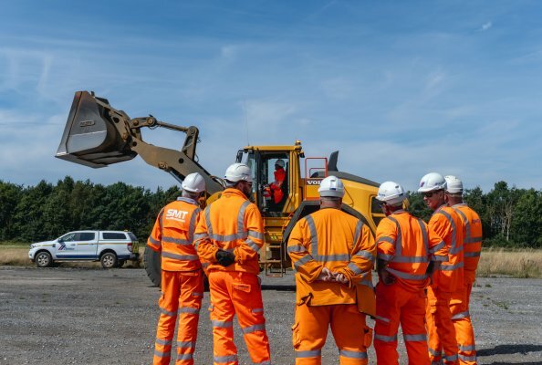 The participants experiment with fuel-saving techniques and compare the difference using real machine data gathered during the training.